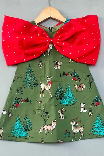 Animal printed green aline dress with big red bow for girls