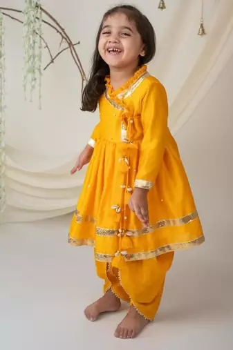 Yellow angrakha style kurti with matching dhoti for girls