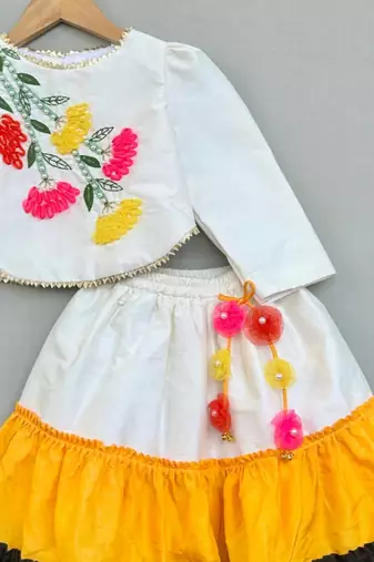 Floral hand embroidered top with tiered lehenged for girls