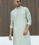 Silk blend embroidered sequinned green kurta