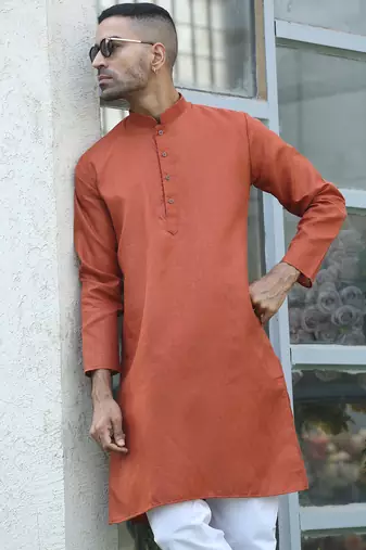 Cotton blend woven self desing rust kurta and pyjamas