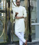 Silk rayon embroidered sequinned cream kurta with elasticated pyjamas