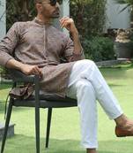 Cotton rayon embroidered sequinned beige kurta with elasticated pyjamas