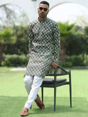 Cotton rayon embroidered chikankari sequinned green kurta with elasticated pyjamas 1