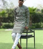 Cotton rayon embroidered chikankari sequinned green kurta with elasticated pyjamas