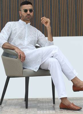 Cotton blend chikankari embroidered white kurta with elasticated pyjamas 1