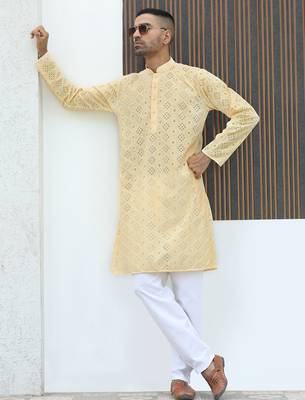 Cotton blend chikankari embroidered yellow kurta with elasticated pyjamas 1
