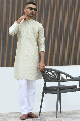 Silk blend embroidered sequinned cream kurta with elasticated pyjamas