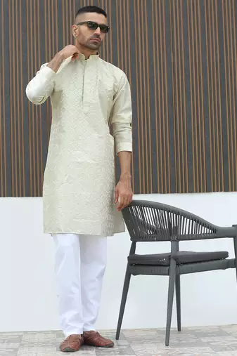 Silk blend embroidered sequinned cream kurta with elasticated pyjamas