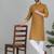 Cotton blend solid mustard kurta with white pyjamas