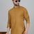 Cotton blend solid mustard kurta with white pyjamas