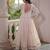 Off white navratri special kora cotton multi thread embroidered & gota patti work gown