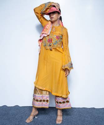 Yellow embroidered organza kurta with pant 1