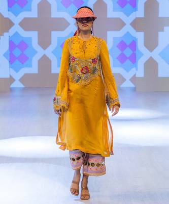 Yellow embroidered organza kurta with pant 4