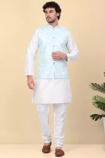 Men silk blend cream kurta and churidar with embroidered blue nehru jacket