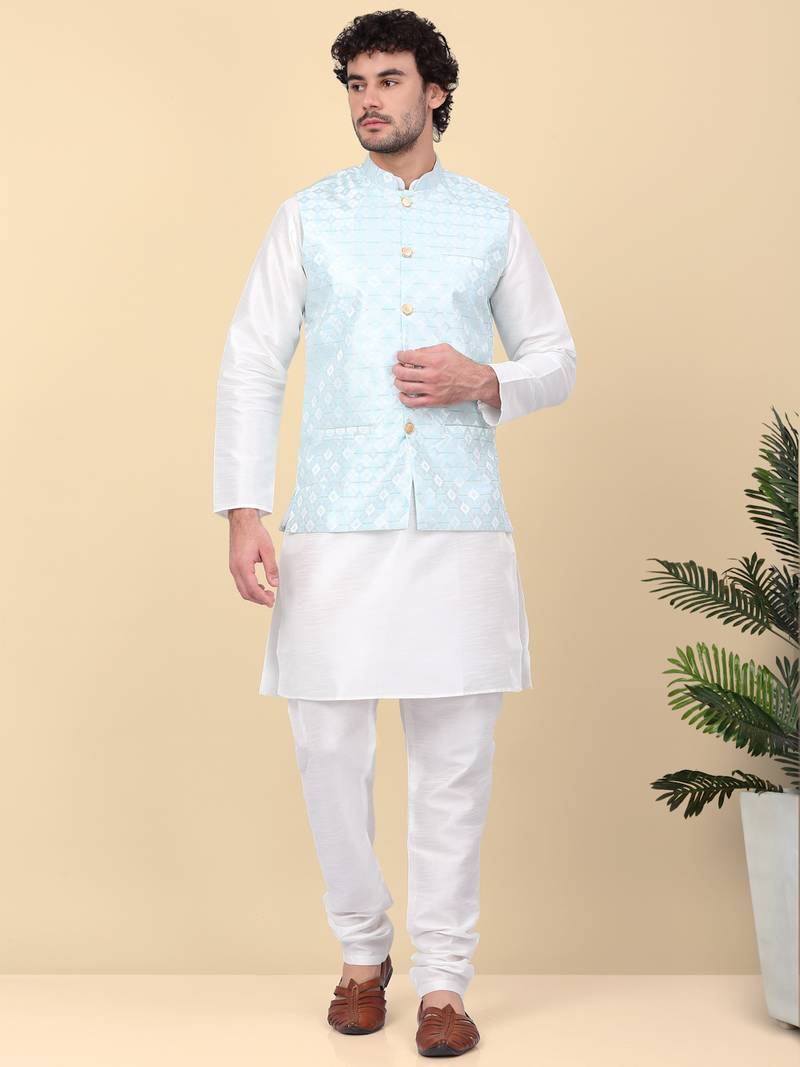 Men silk blend cream kurta and churidar with embroidered blue nehru jacket