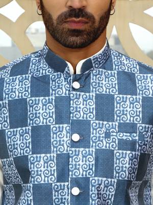 Silk blend solid cream kurta and churidar with blue printed nehru jacket 2