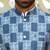 Silk blend solid cream kurta and churidar with blue printed nehru jacket