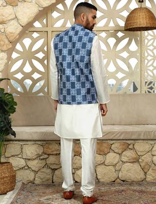 Silk blend solid cream kurta and churidar with blue printed nehru jacket 3