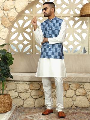 Silk blend solid cream kurta and churidar with blue printed nehru jacket 4