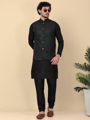 Men silk blend black kurta and churidar with embroidered green nehru jacket 1