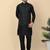 Men silk blend black kurta and churidar with embroidered green nehru jacket