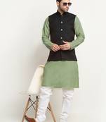 Cotton green kurta and pyjama with twill black nehru jacket