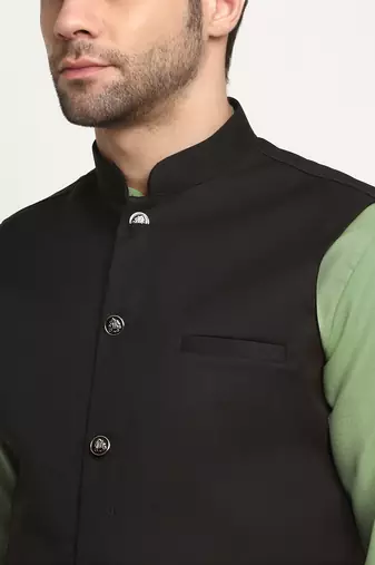 Cotton green kurta and pyjama with twill black nehru jacket