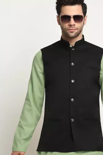 Cotton green kurta and pyjama with twill black nehru jacket