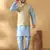Silk blend blue kurta and churidar with jacquard geometric beige nehru jacket