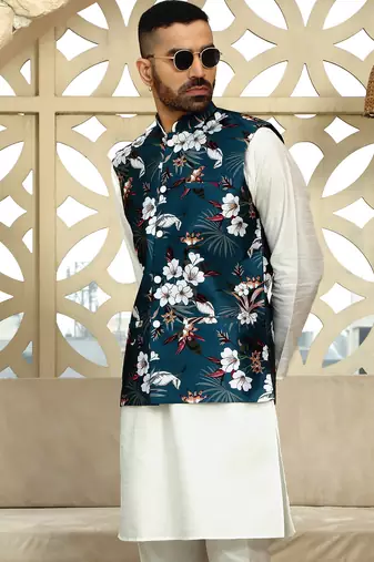 Silk blend solid cream kurta and churidar with floral blue nehru jacket