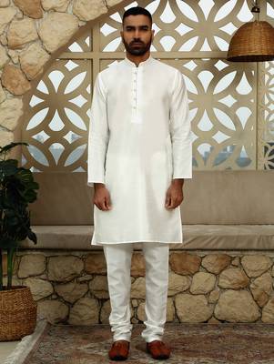 Silk blend solid cream kurta and churidar with floral blue nehru jacket 6