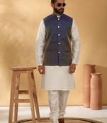 Silk blend cream kurta and churidar with jacquard geometric blue nehru jacket