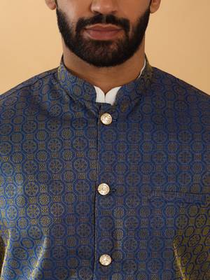 Silk blend cream kurta and churidar with jacquard geometric blue nehru jacket 2