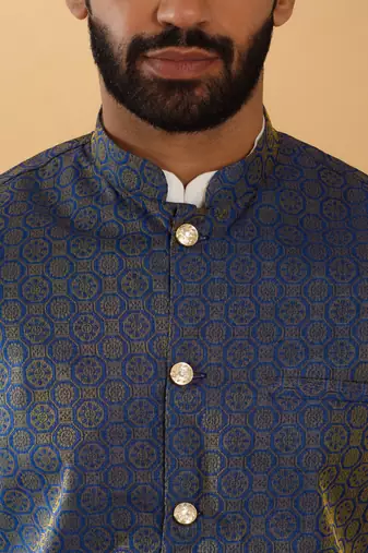 Silk blend cream kurta and churidar with jacquard geometric blue nehru jacket