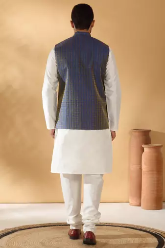 Silk blend cream kurta and churidar with jacquard geometric blue nehru jacket