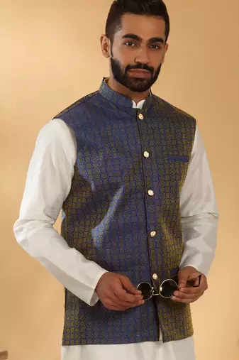 Silk blend cream kurta and churidar with jacquard geometric blue nehru jacket