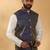Silk blend cream kurta and churidar with jacquard geometric blue nehru jacket