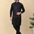 Men silk blend black kurta and churidar with embroidered navy blue nehru jacket