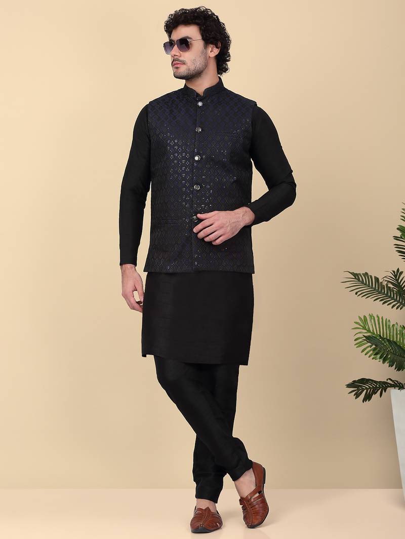 Men silk blend black kurta and churidar with embroidered navy blue nehru jacket