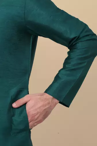 Men silk blend green kurta and churidar with embroidered nehru jacket