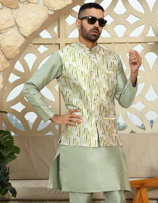 Silk blend solid olive green kurta and churidar with tie-dye green nehru jacket 1