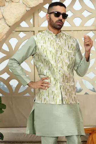 Silk blend solid olive green kurta and churidar with tie-dye green nehru jacket
