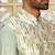 Silk blend solid olive green kurta and churidar with tie-dye green nehru jacket