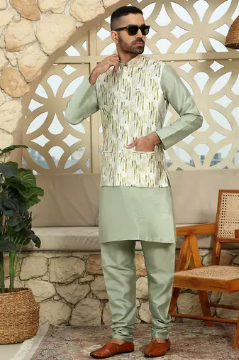 Silk blend solid olive green kurta and churidar with tie-dye green nehru jacket