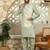 Silk blend solid olive green kurta and churidar with tie-dye green nehru jacket