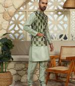 Silk blend solid olive kurta and churidar with green printed nehru jacket