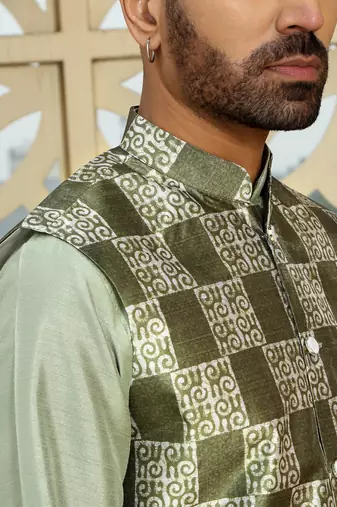 Silk blend solid olive kurta and churidar with green printed nehru jacket