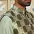 Silk blend solid olive kurta and churidar with green printed nehru jacket