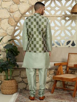 Silk blend solid olive kurta and churidar with green printed nehru jacket 4